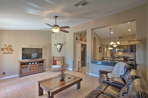 Relax in the living room and watch your favorite shows, movies, or sports.