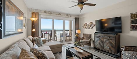 The ocean front living room is well-appointed with comfortable furnishings.