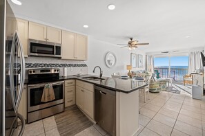 Luxurious updated kitchen with beautiful granite counter tops.