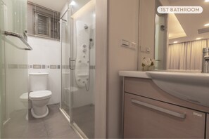 Bathroom 1 (Ensuite):
• Shower Stall & Panel
• Essential Toiletries & Towels