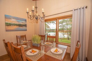 DIning Table seats 6 with views of the lake.