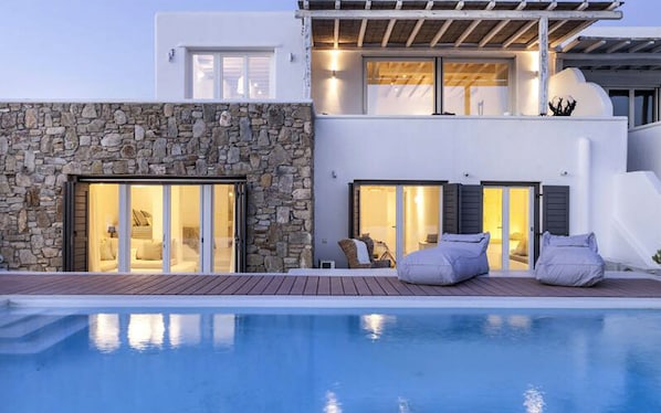 Groundfloor suites by the pool and 1st floor living room with kitchen