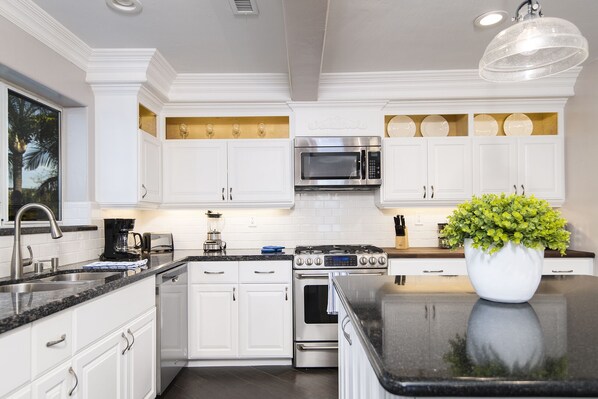 Create your next memories in our custom, beautifully crafted chef's kitchen.