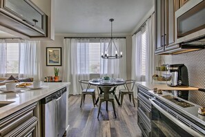This modern kitchen offers updated appliances and all the cooking essentials.