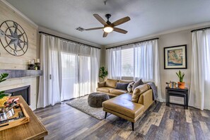 Unwind on the leather sofa and watch a Netflix show on the flat-screen TV.