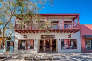 The right side of the balcony is the 110 St. George apartment.  Enter through the middle door between the Earthbound entrances.