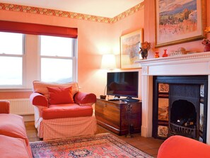 Living room with feature fireplace | Vindolanda, Fearnbeg, near Applecross