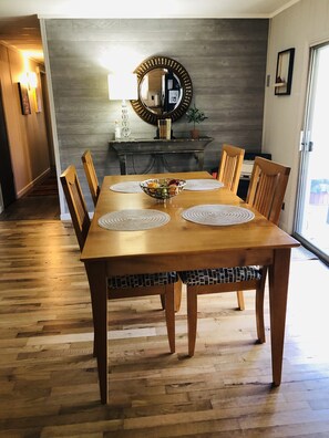 Dining area leading to the back deck.
Seating for 6 available.