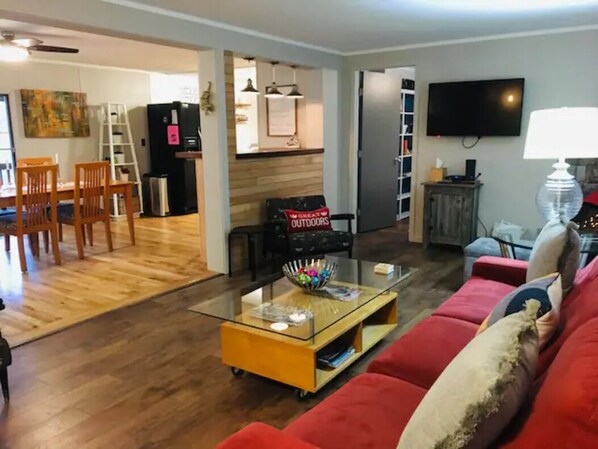 Open living room overlooking the kitchen and breakfast bar. 