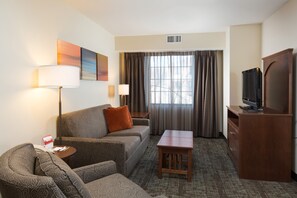 Sink into the cozy sofa after a day exploring the area.