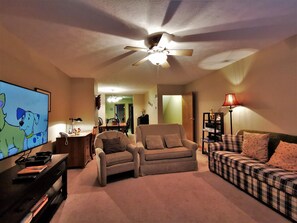 Huge family room with brand new big screen tv