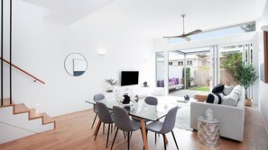 Experience the spaciousness of our open-plan layout, seamlessly blending comfort and modern style for your enjoyment