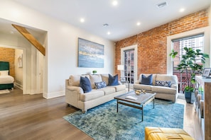 Open concept living, kitchen, and dining area with comfortable seating options for you and your guests. 65” Samsung Smart 4K TV for streaming apps and DIRECTV Entertainment. Pub-style dining table with seating for three. All the natural light too!