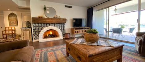 Gas fireplace and satellite tv.  Step out the patio door to the golf course. 