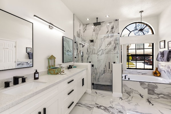 En Suite bathroom with double vanity, seperate tub and shower