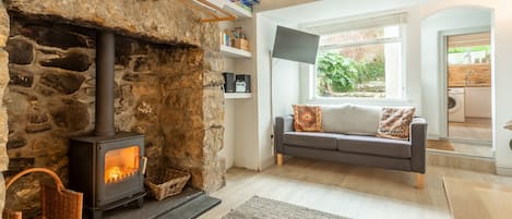 Porthgwidden Cottage, Lelant. Ground floor: Sitting room, cosy up next to a wood burning stove