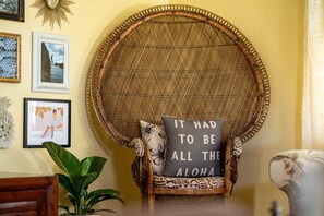 The vintage peacock chair is a great spot to relax!