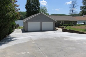 One side of garage is available for use. You can see boat ramp to the left.