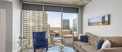 Living room with beautiful view of downtown GR!