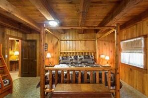 The main bedroom with king bed and bunks. Its own full bathroom with a tub