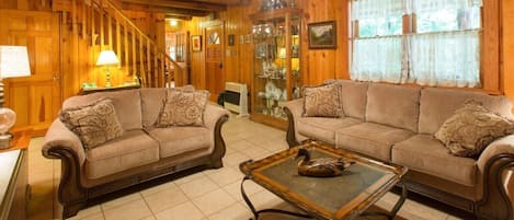 Relax and enjoy a piece of Western NC history at White Squirrel Log Cabin.