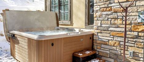 Soak away sore muscles or just relax in the private hot tub!