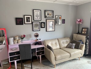 Dressing and relaxing space in the main bedroom