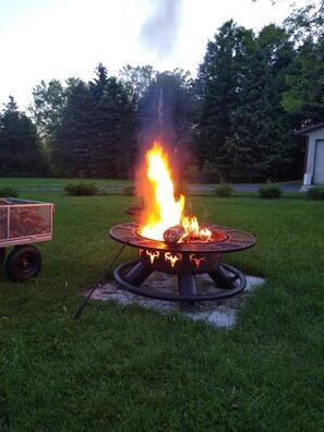 sit by our fire pit and enjoy a peaceful evening.