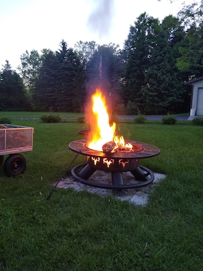 sit by our fire pit and enjoy a peaceful evening.