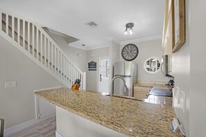 Staircase to both upstairs bedrooms