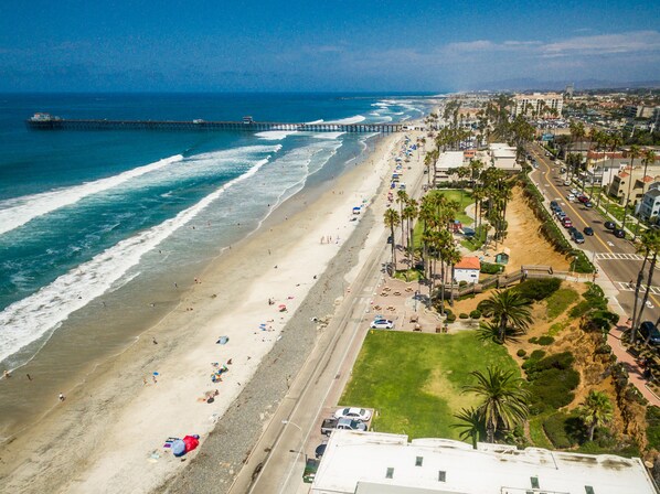 Oceanside beach looking North toward the pier & harbor