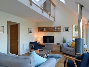 Relaxing living area with wood burner | Rowan House, Carbost, near Portree