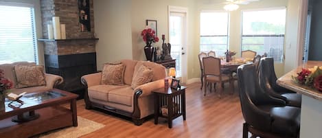 Living room and dining area during the day