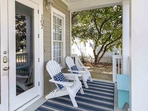 Relax on the front porch after a long day on the beach