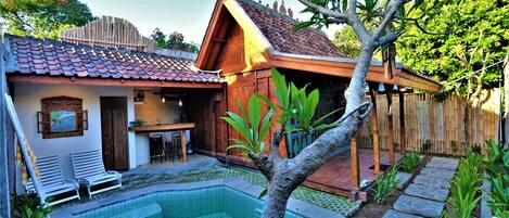 an antique crafted teak wood holiday home ..