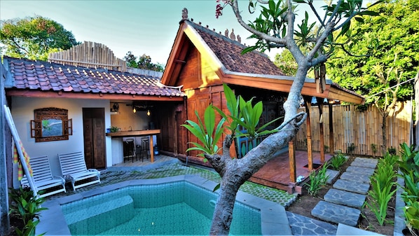 an antique crafted teak wood holiday home ..