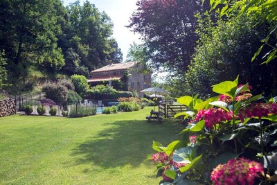 Le Pommier, a tranquil retreat with pool in its own valley 30 miles from the sea
