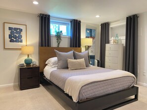 Rest well in our luxury breathable foam and coil mattress and blackout curtains.