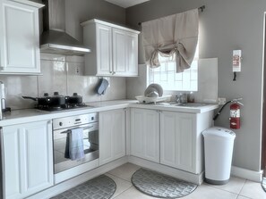 The kitchen is spacious enough for three cooks! 