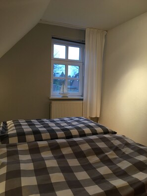 Das helle Schlafzimmer.