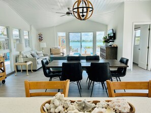 Open concept living with large windows and patio doors throughout villa!