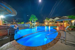 Both pools are beautifully lit up in the evening