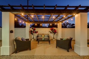 Poolside pergola is a great place to wind down your day!