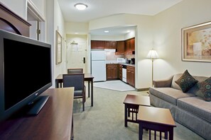 Prepare meals in the kitchen and enjoy them at the dining table.
