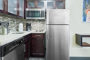 The fully-equipped kitchen features all the amenities you'd need to make a delicious meal.