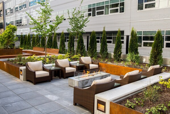 Relax on the shared terrace with new and old friends.