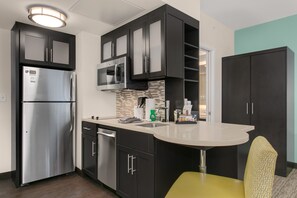 Curb your appetite by cooking a meal in your kitchen.