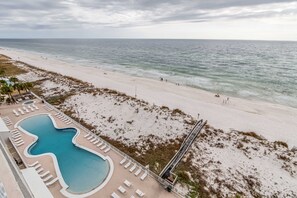 Outdoor Communal Pool - Ocean House offers a zero entry outdoor communal pool. Plenty of chairs are provided for each guest to enjoy much needed vitamin D and sea!