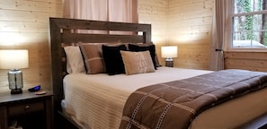2nd Bedroom with Queen bed and view of the back forest/mountain