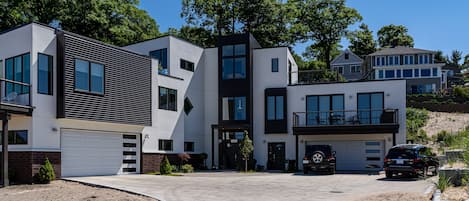 This brand new construction home has the best views of the Grand Haven Beach you can find!